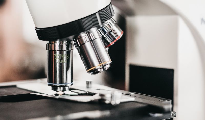 Does stem cell therapy work for back pain - close up of a microscope in a lab.